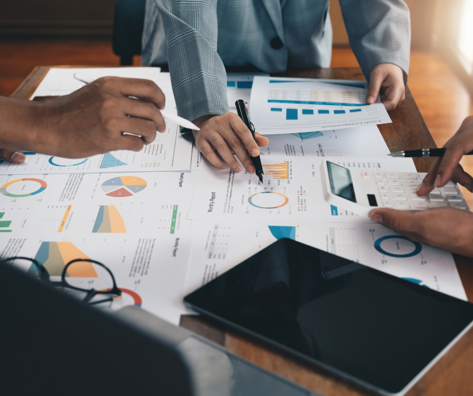 Business team reviewing charts and graphs