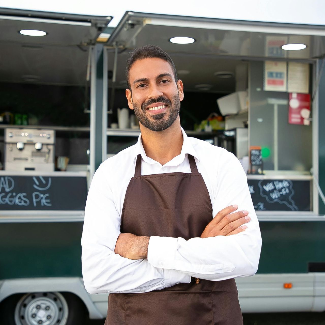image of man looking directly in front of the camera, smiling