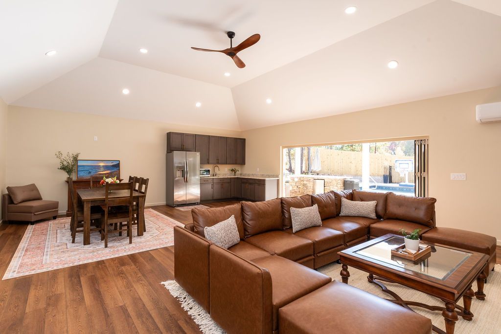 Poolhouse with large family room and kitchen. 