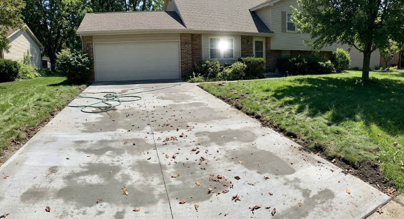 Brand new smooth concrete driveway installed by a Winchester VA concrete contractor.