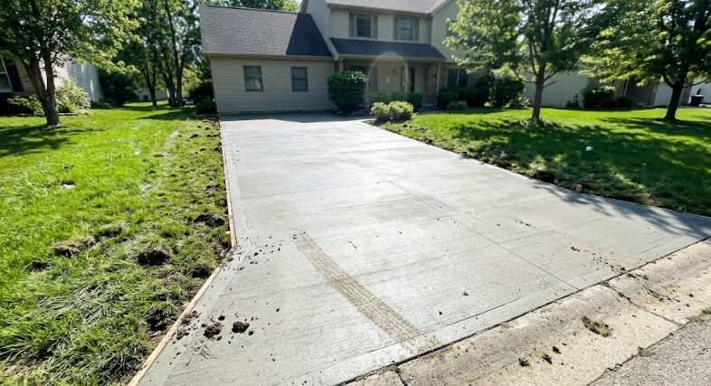 Smooth new concrete driveway installed by a professional contractor in Harrisonburg VA.