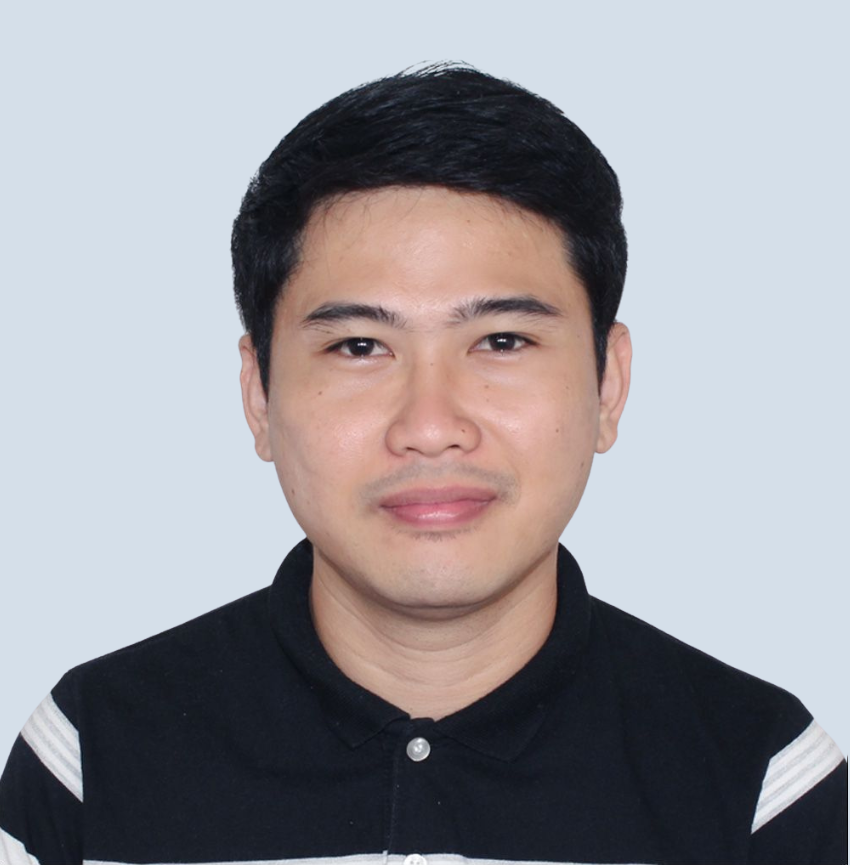 A man wearing a black buttoned shirt