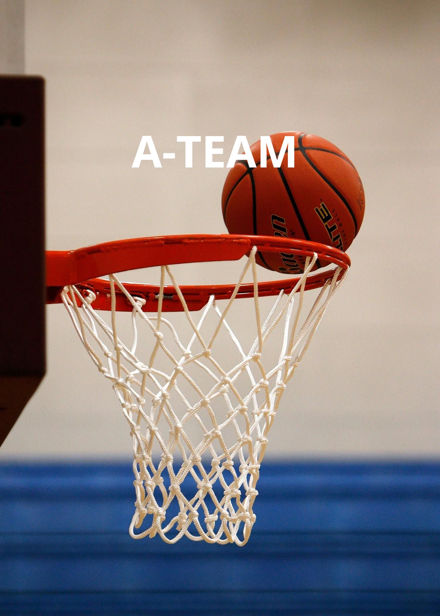 Basketball resting on a hoop rim above a white net, with “A-TEAM” text overlaid