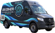 Black and blue service van with phone number and company logo on the side, shown on a white background