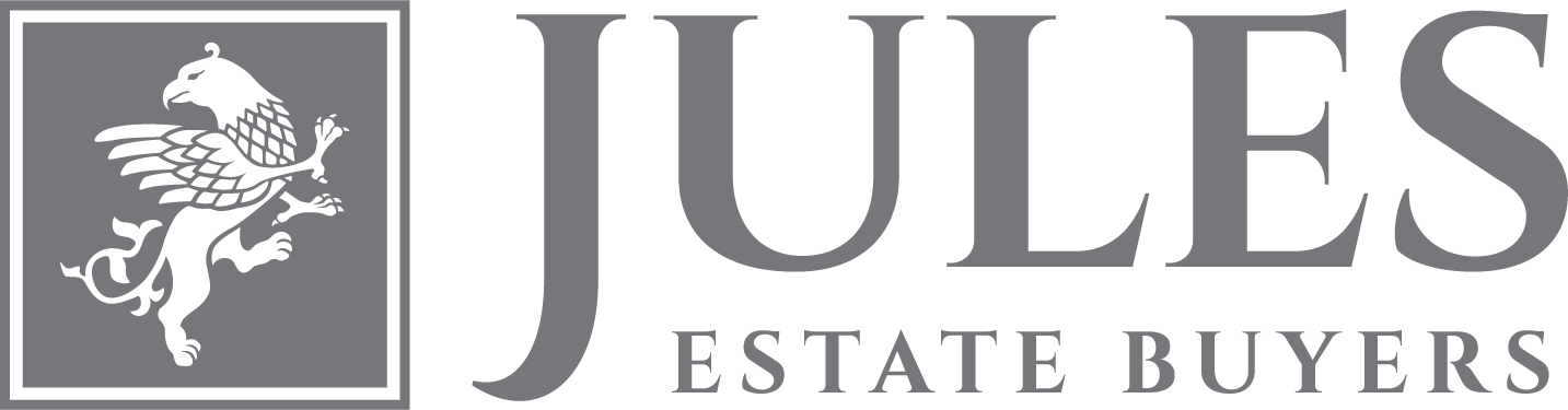 A black and white logo for jules estate buyers
