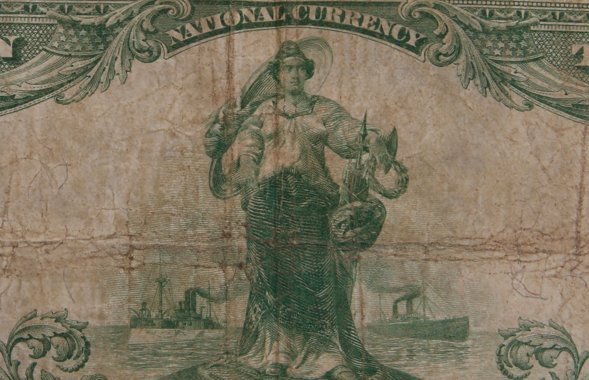 A close up of a national currency bill with a woman on it