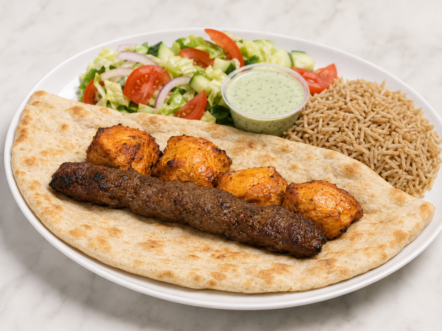 Grilled meat and vegetables on flatbread with rice and green sauce on a white plate