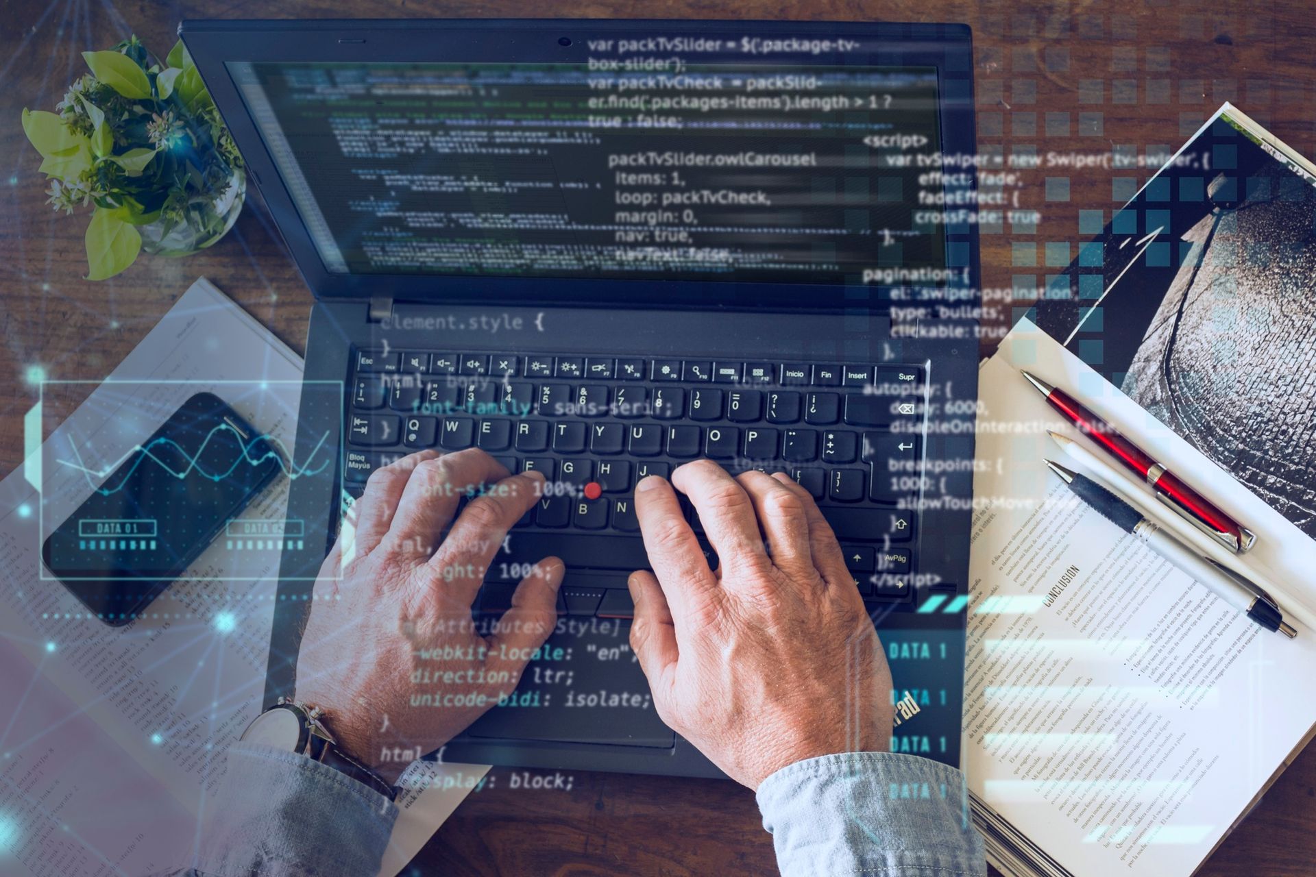 person coding and programming on a laptop