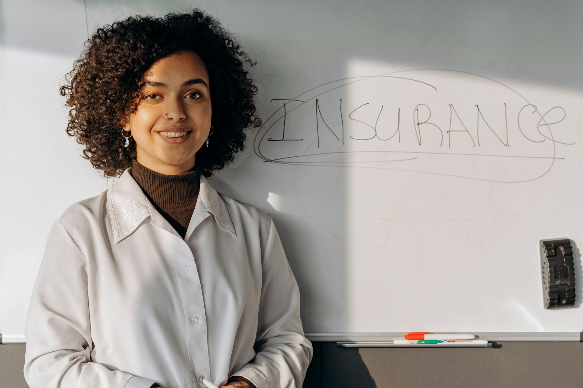 Caribbean insurance client using mobile app to access policy documents and claim status