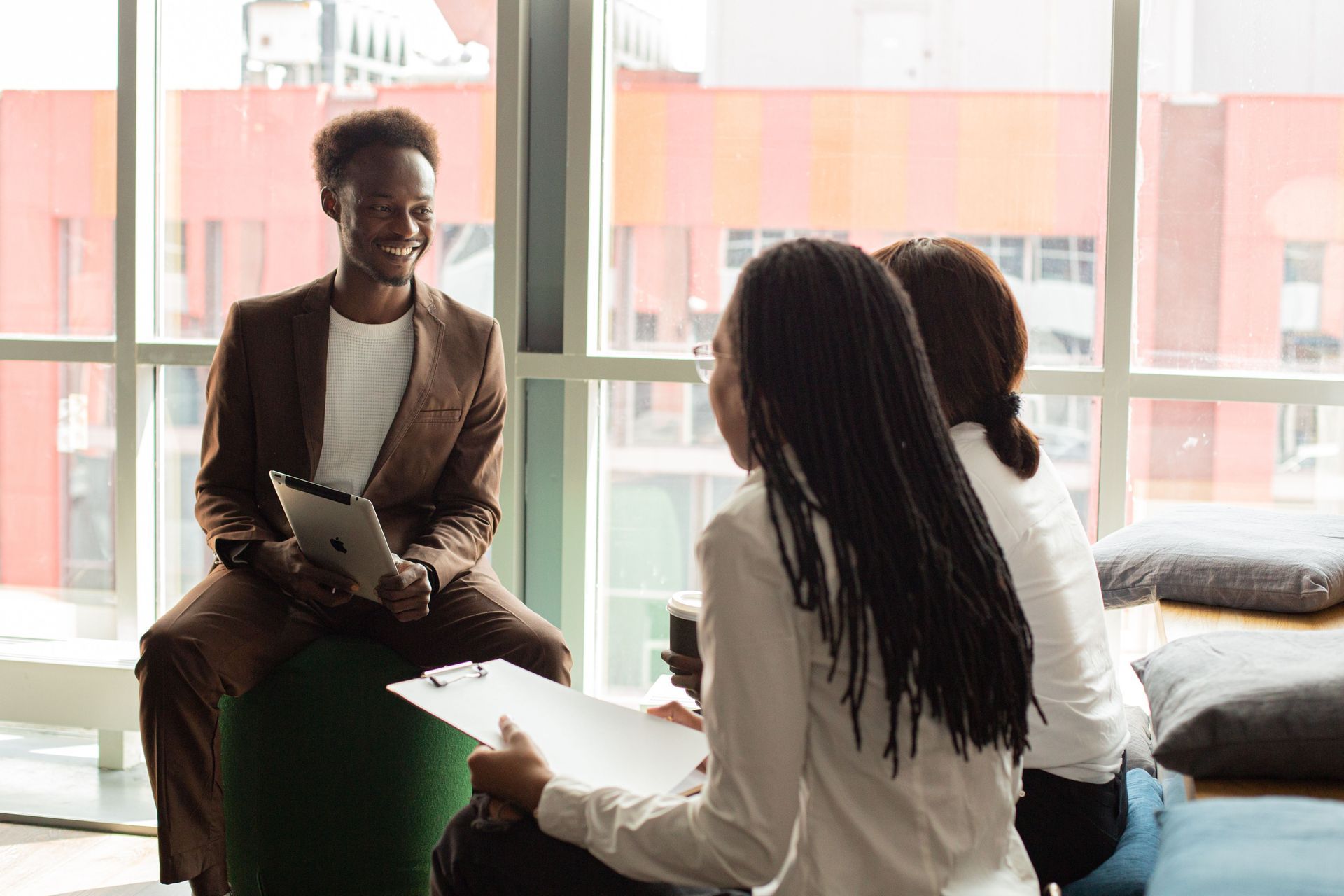 Caribbean insurance brokerage principal reviewing digital transformation ROI and platform options on