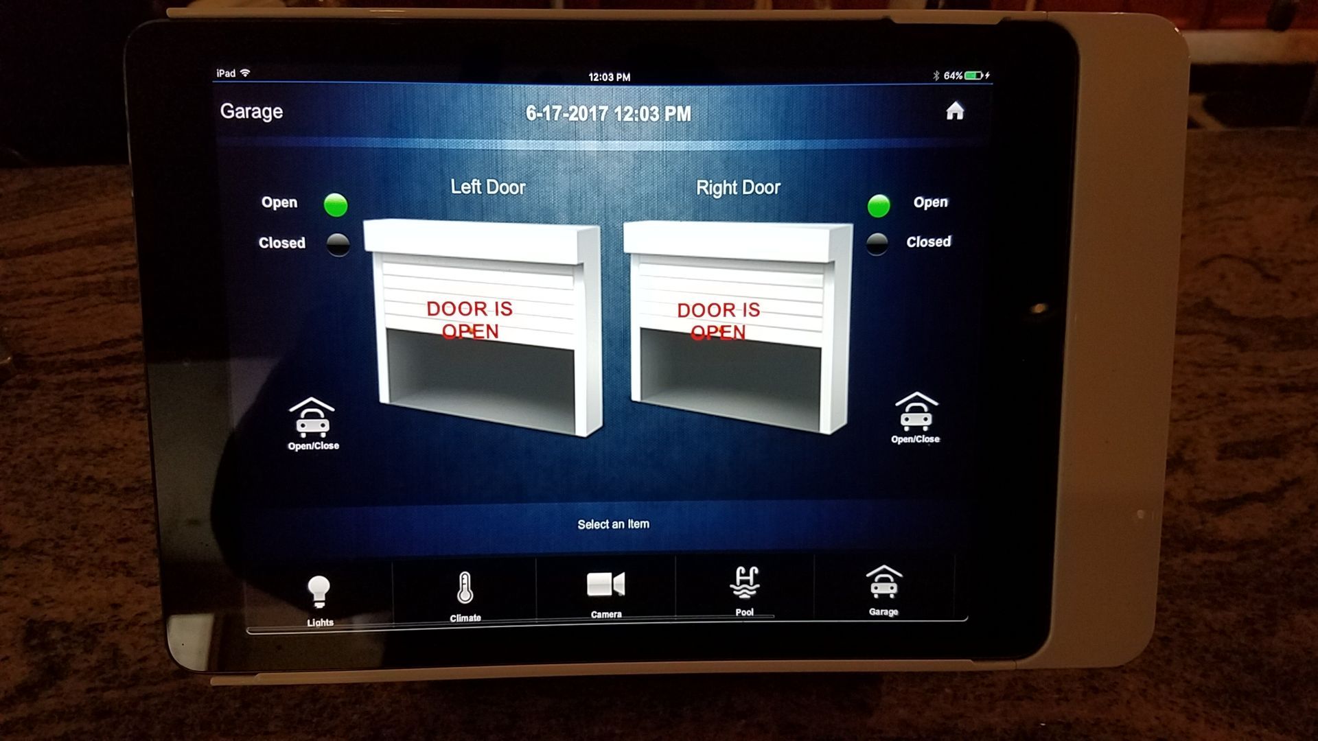 A tablet with a screen that says ' garage ' on it