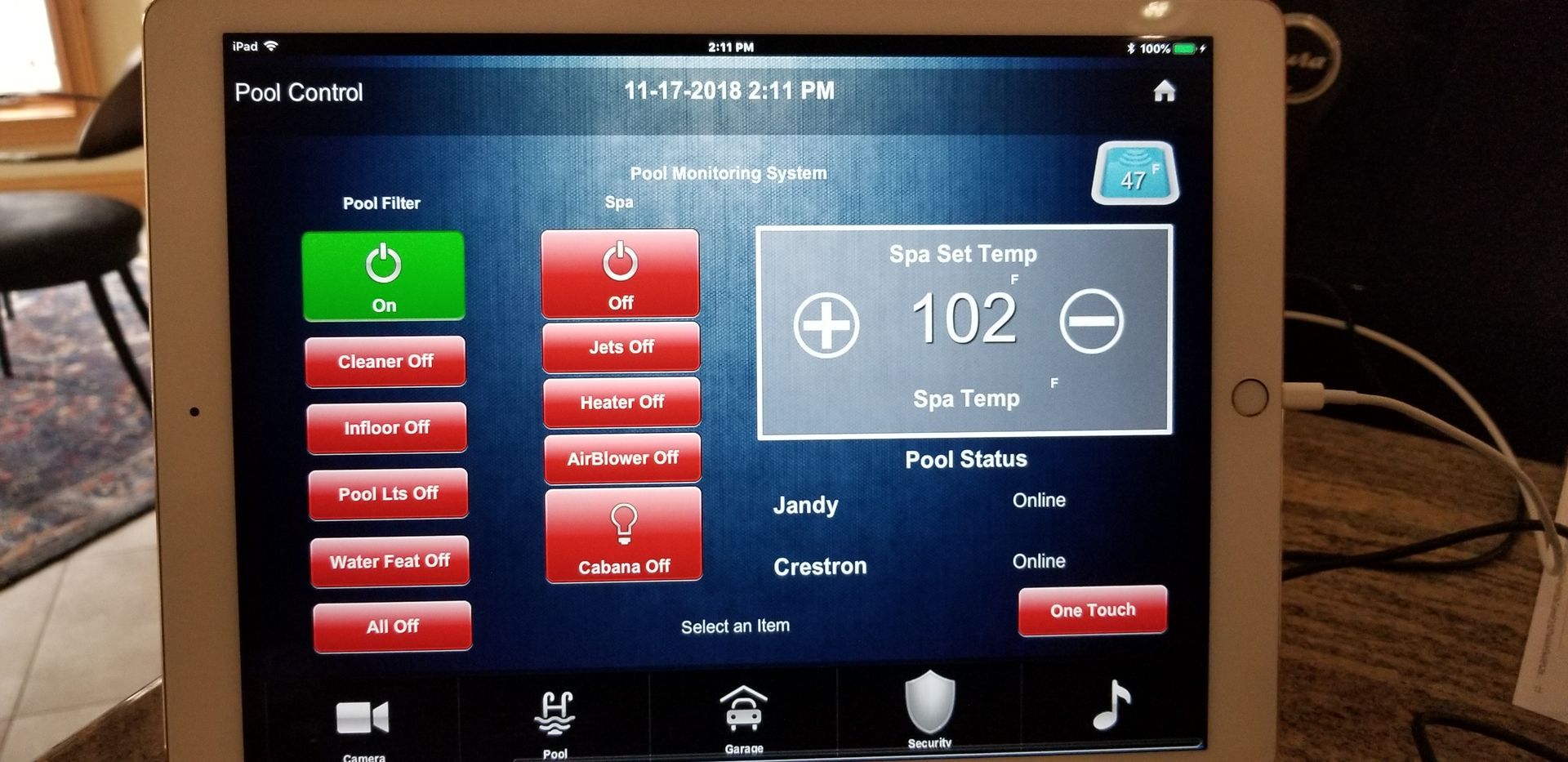 A tablet with a screen that says 102 on it