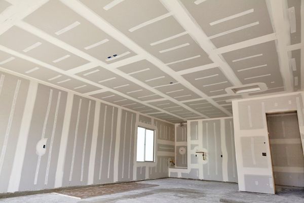 Freshly installed drywall with taped seams by Anaheim Drywall Contractor creating smooth walls and ceilings.