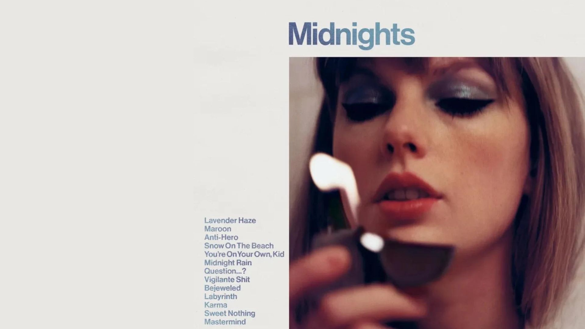 A woman is holding a lighter in front of her face.