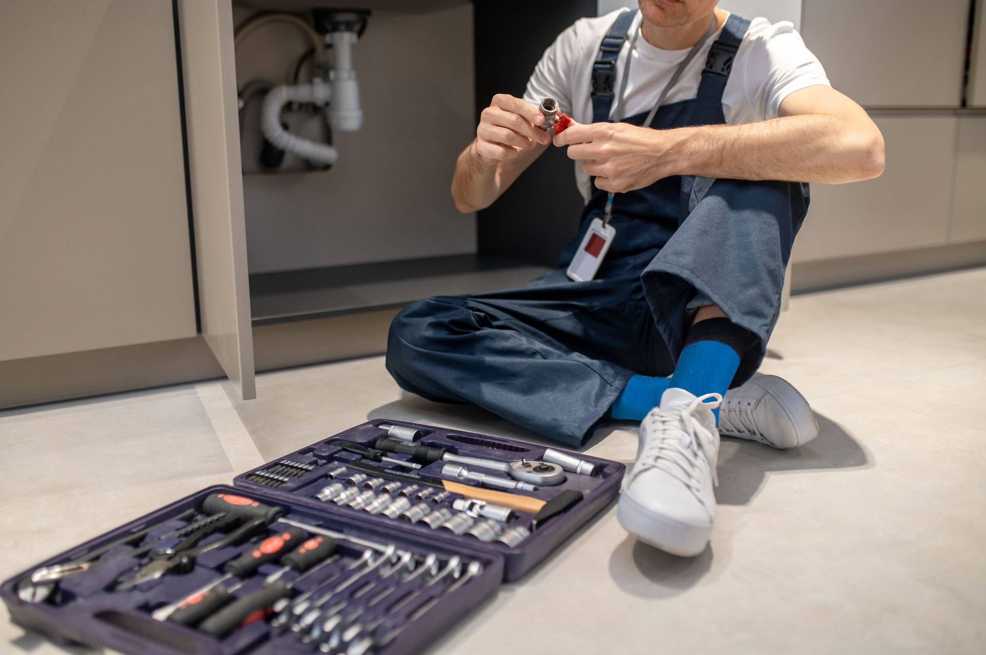 plumber with their tools