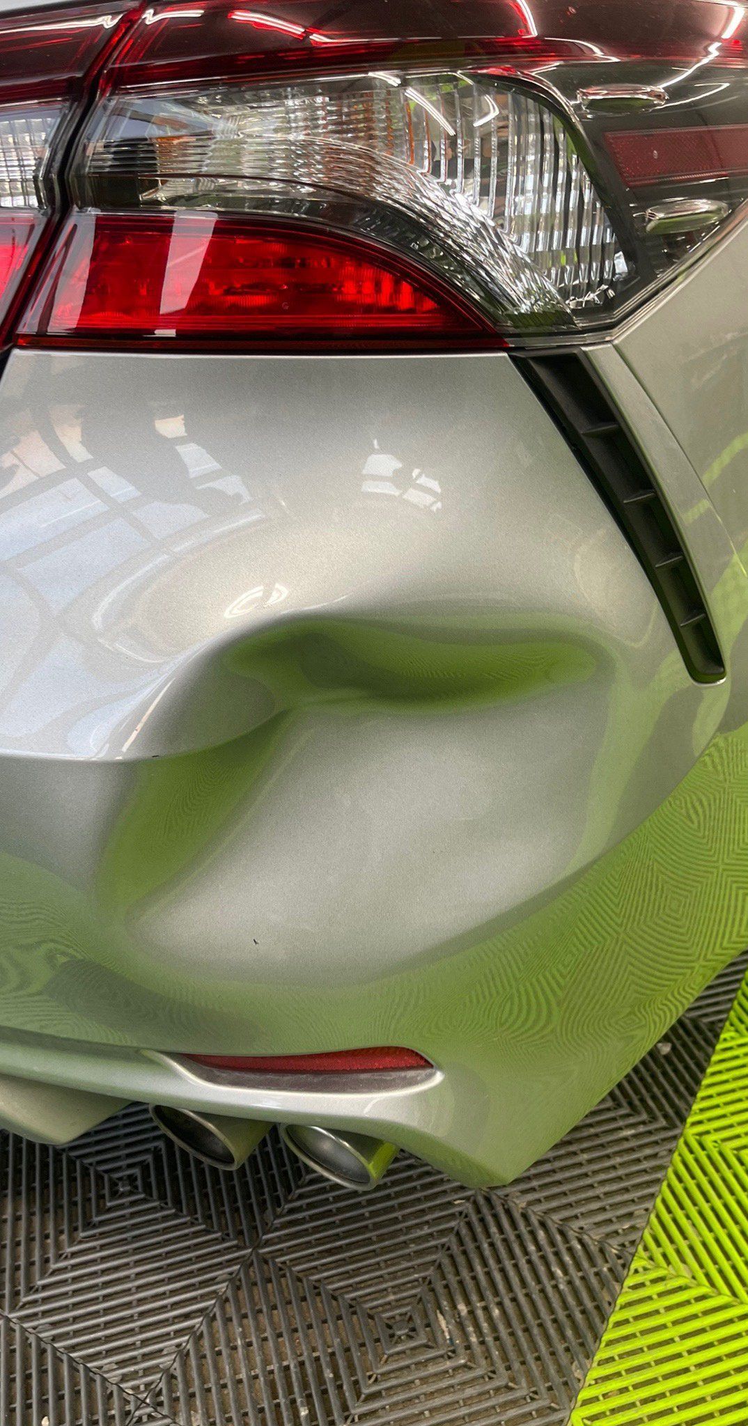 before bumper dent
