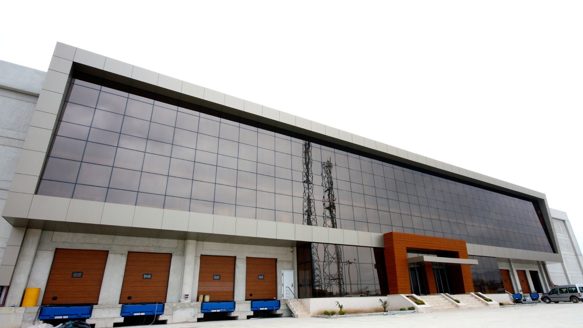 Industrial manufacturing facility exterior — commercial cleaning services for industrial and distribution sites