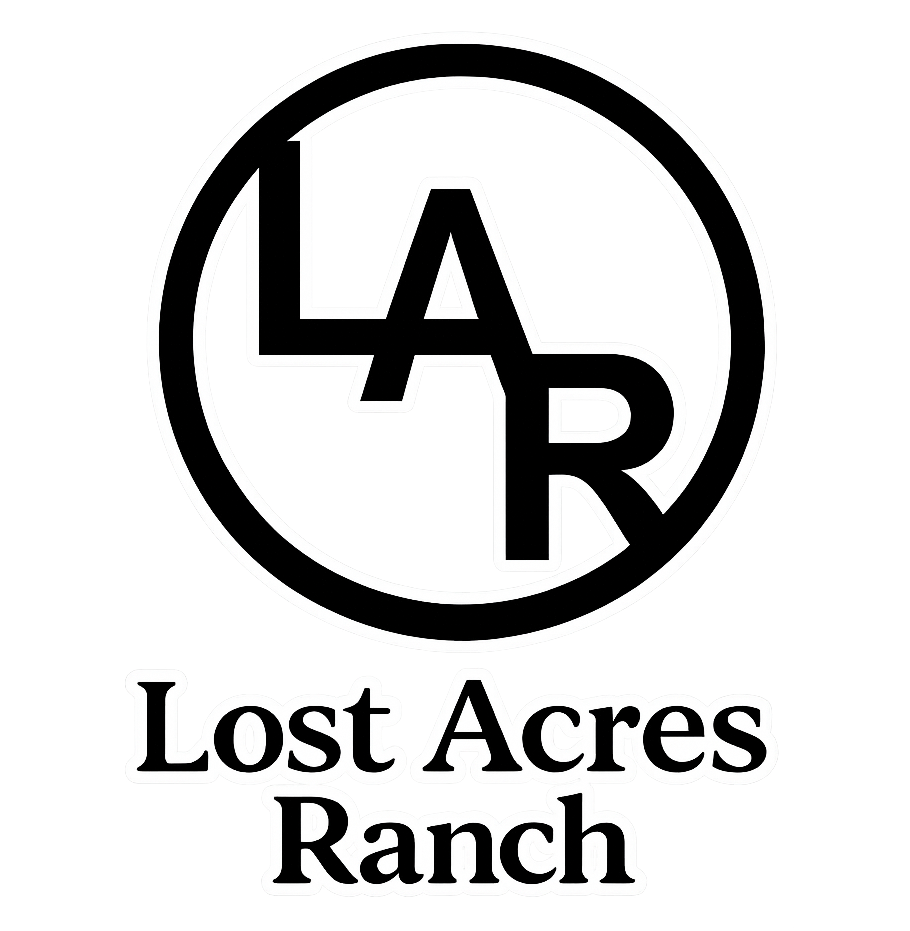 Black circular logo containing the letters "LAR" above the text "Lost Acres Ranch".