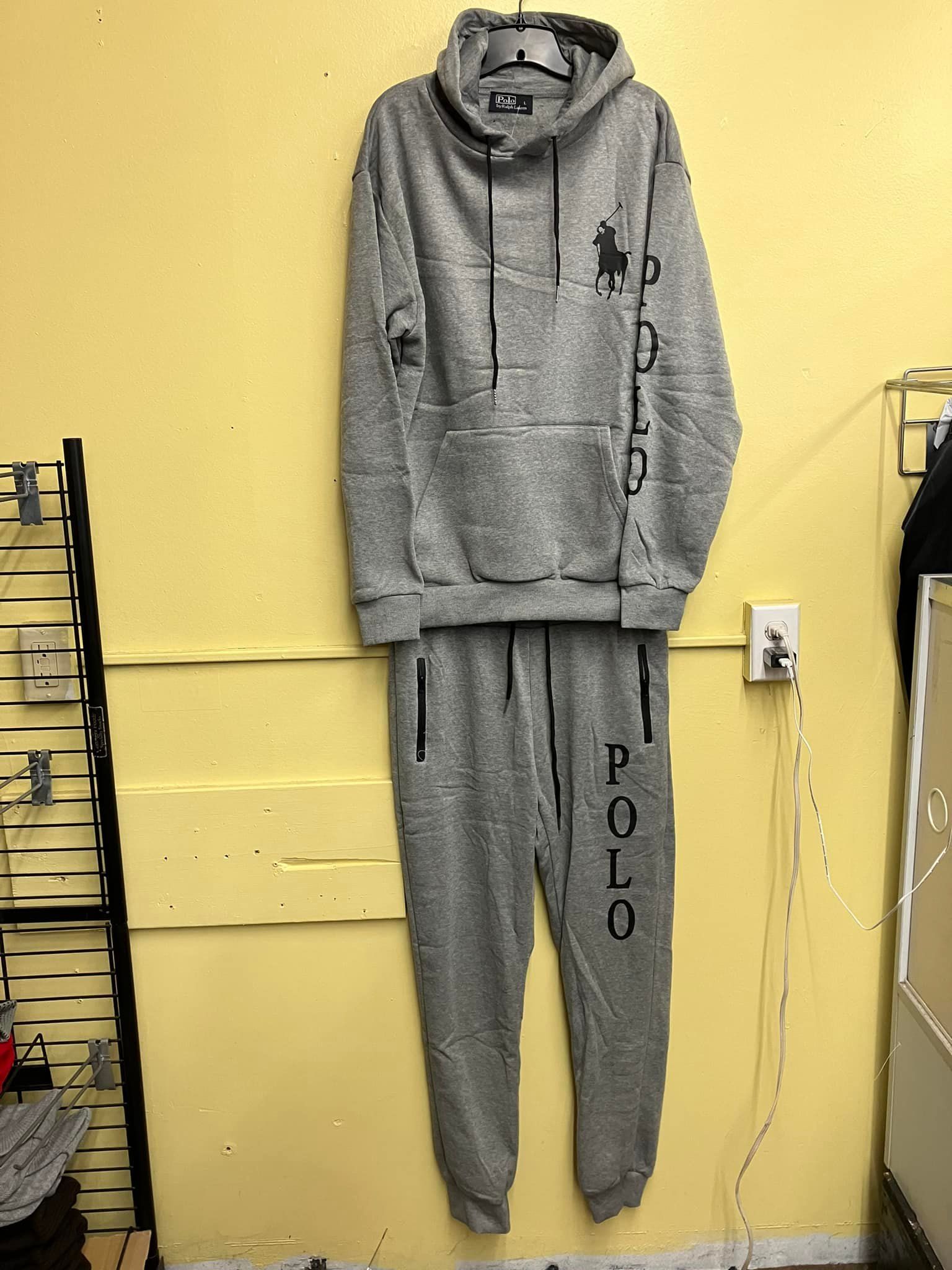 A gray hoodie and matching sweatpants set with 