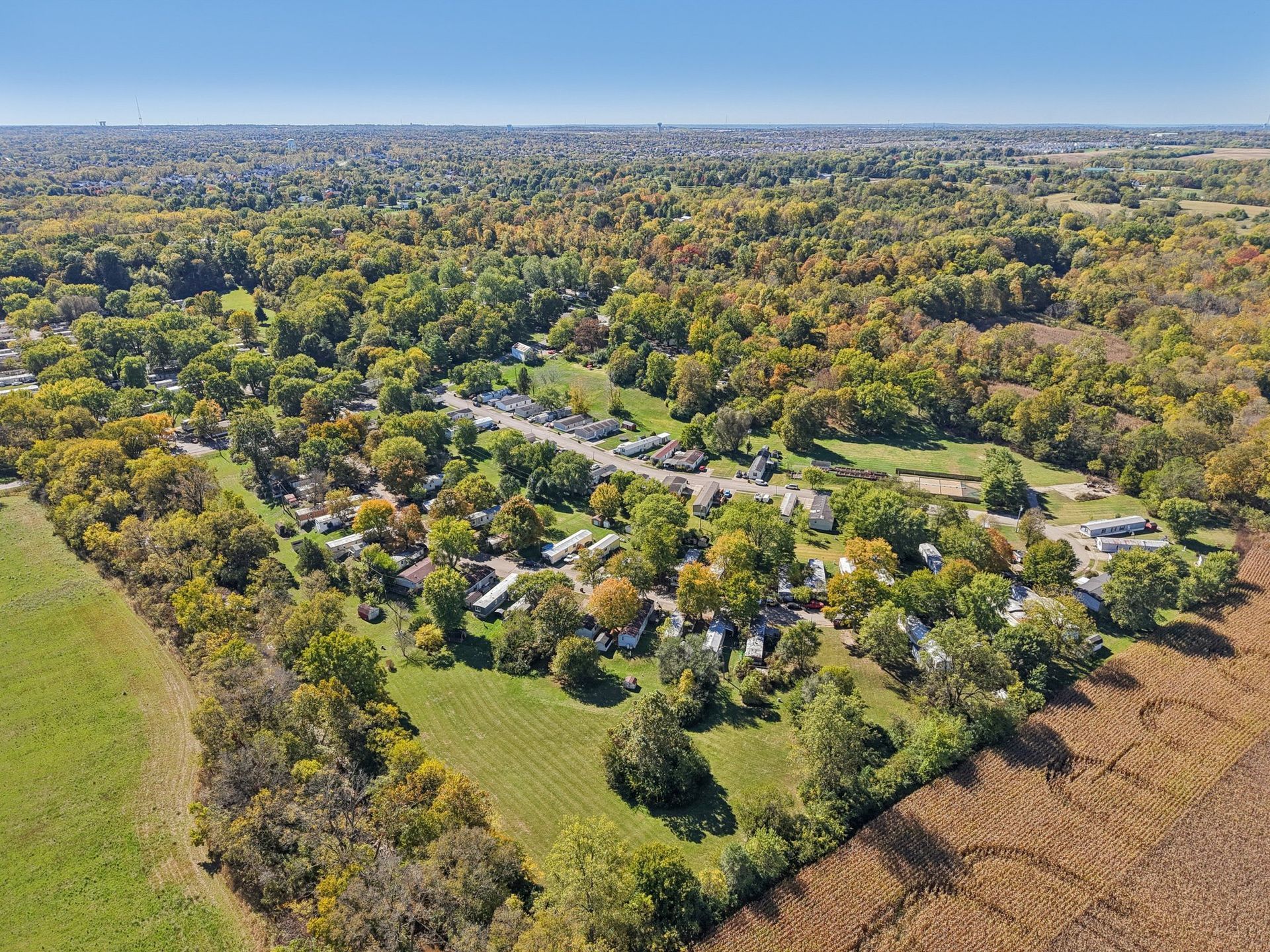 Aerial view of the manufactured home community surrounded by nature.