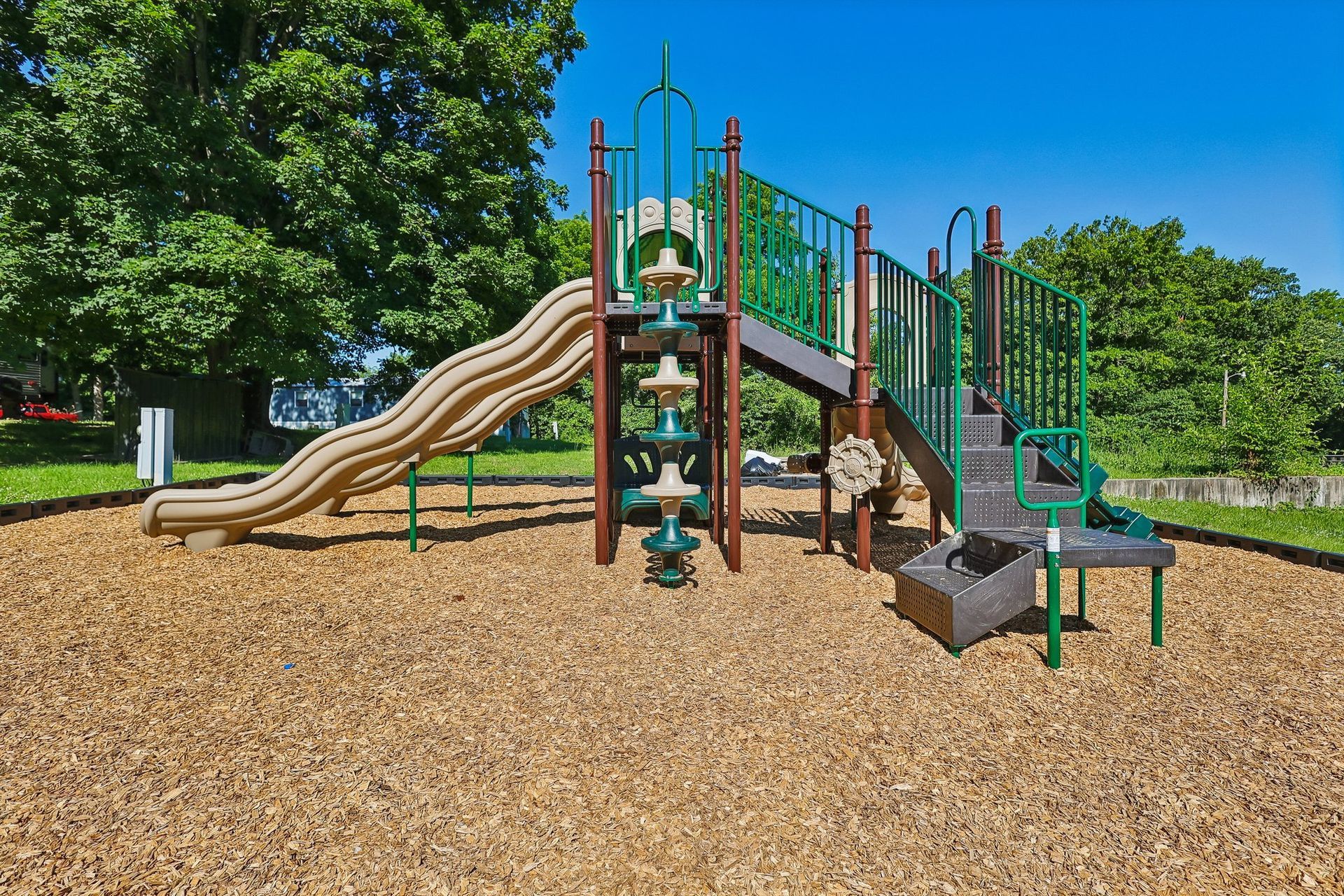 Community playground with slides and climbing equipment for families.