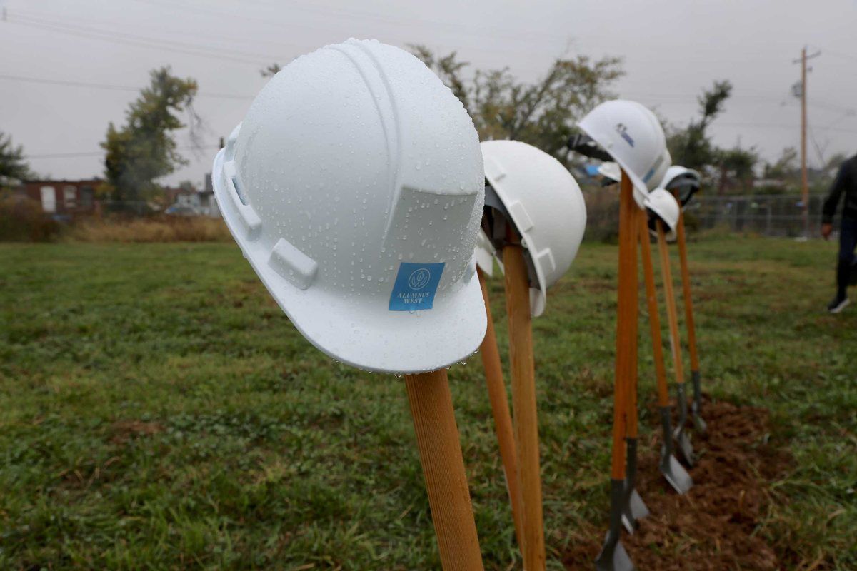 Hard hats and ceremonial shovels set out at the Alumnus Gardens West groundbreaking.