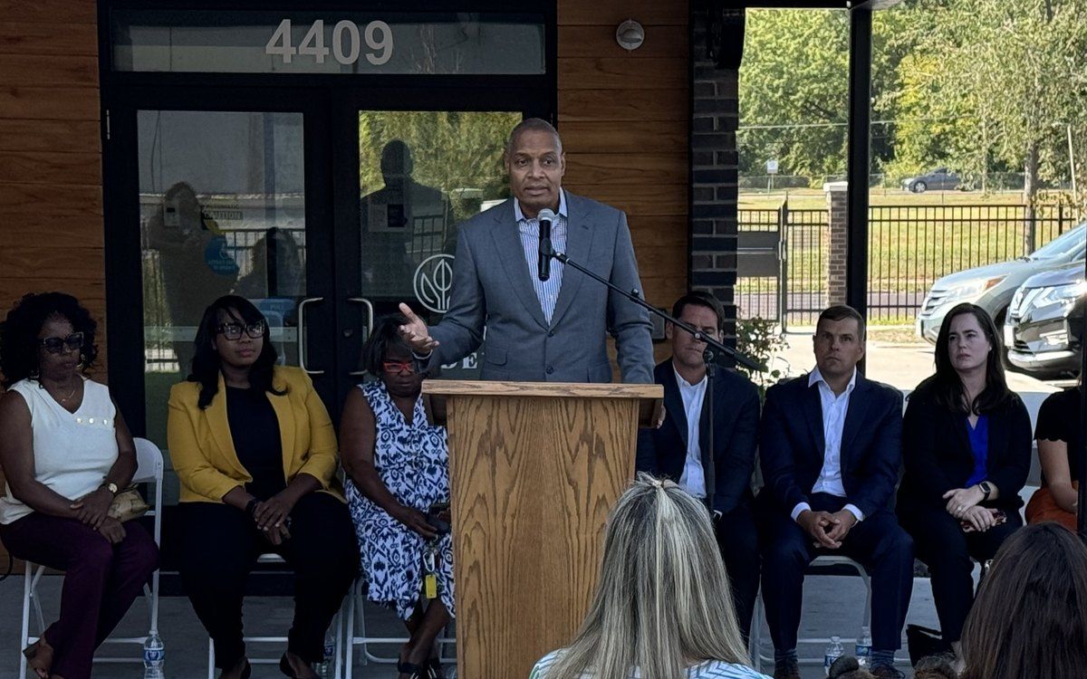 Dr. Troy Nash speaking at the Alumnus Gardens opening, the 4409 entrance behind him.