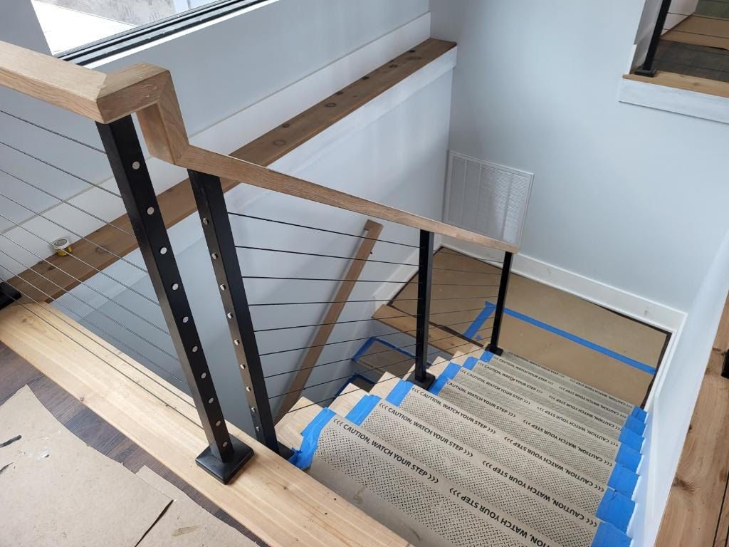 Interior cable railing staircase with wood treads, Greenville SC