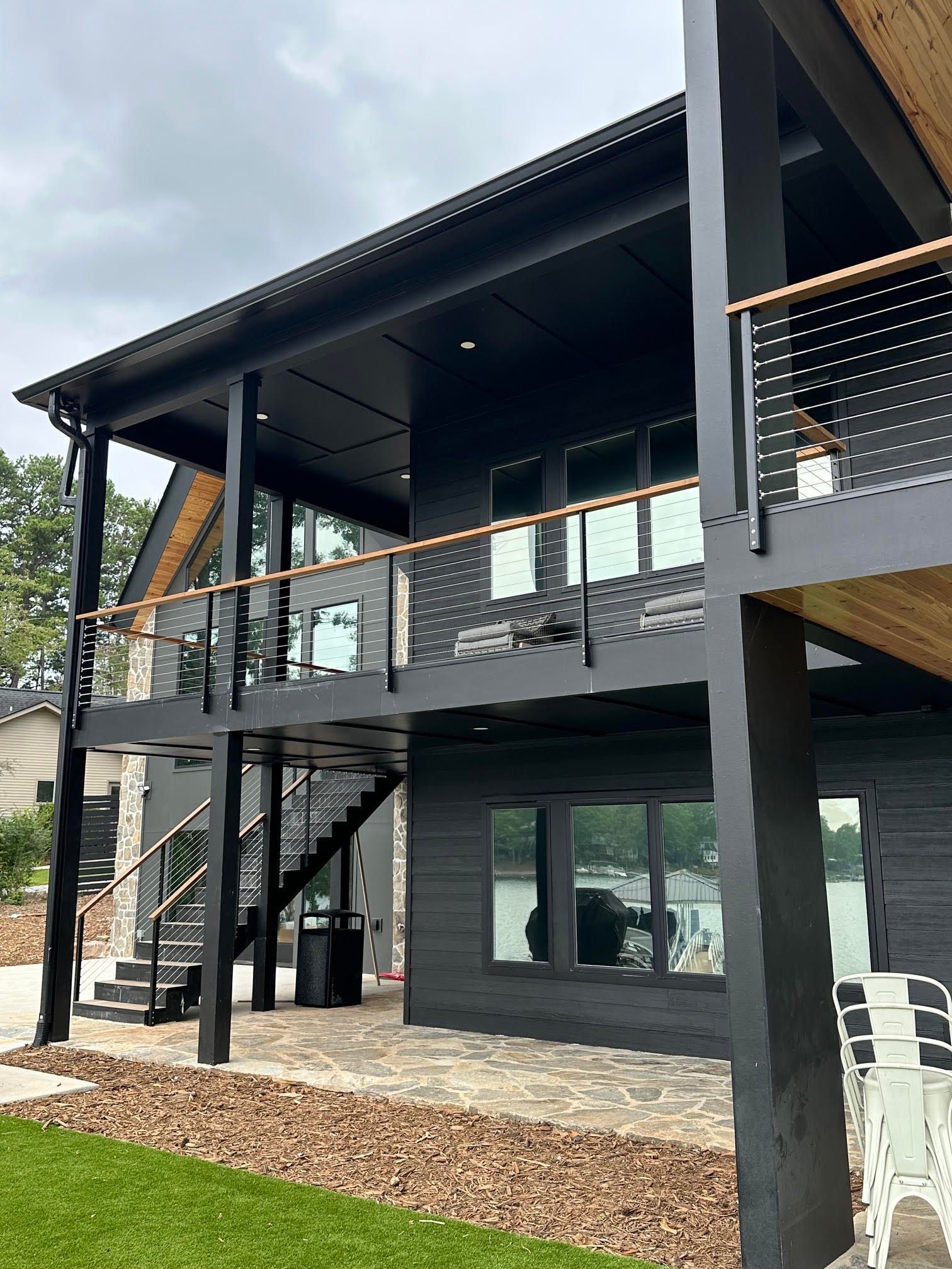 Cable railing with wood top rail on a lakefront deck, Greenville SC