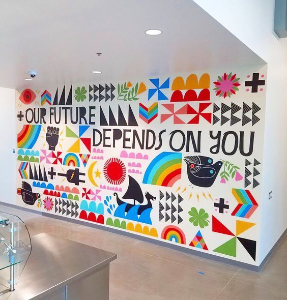 A colorful wall with the words 