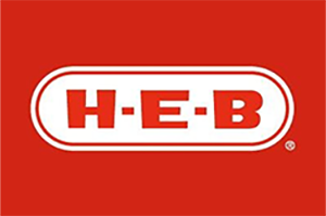 H-E-B logo in white letters, inside a white-outlined oval, on a red background.