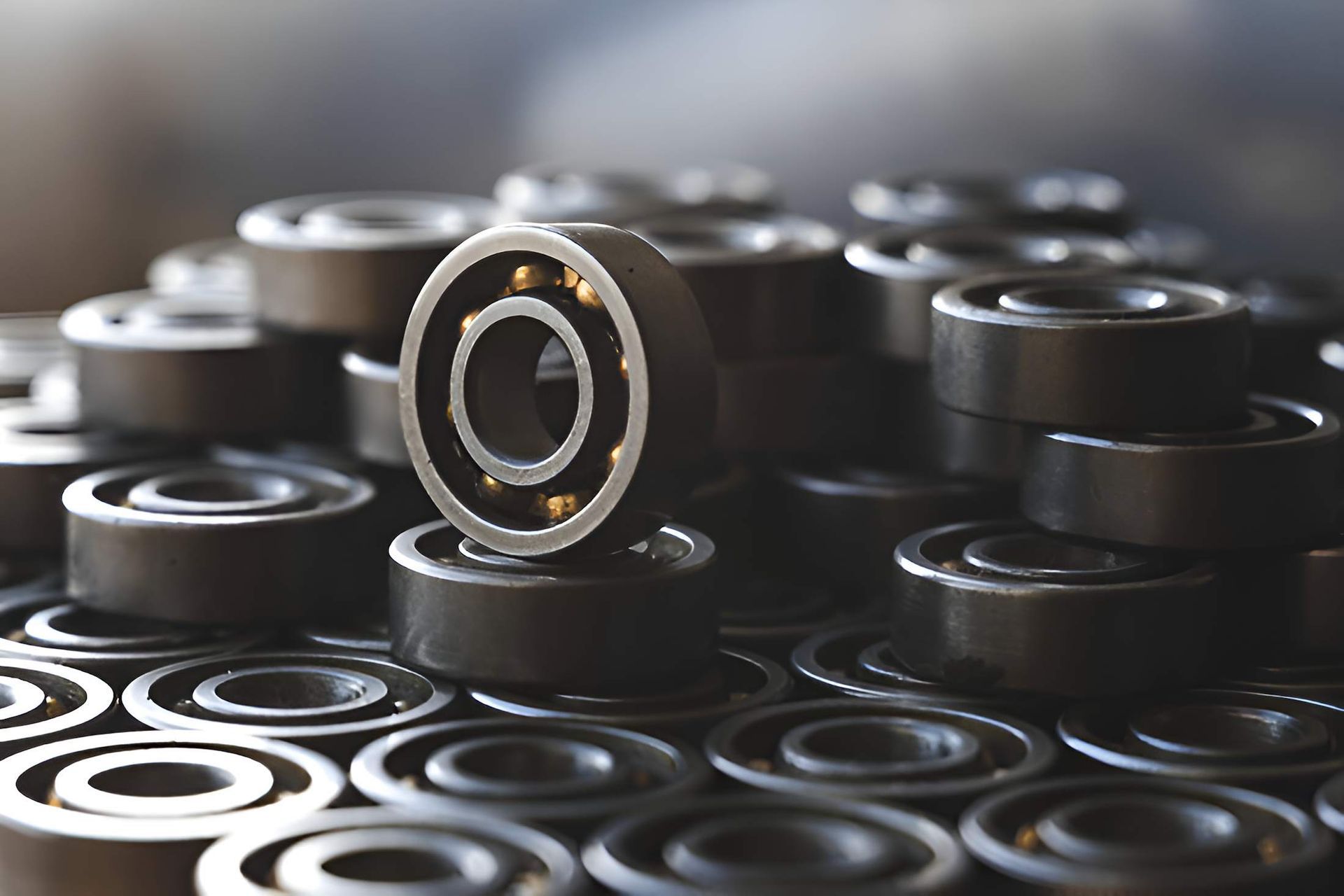 A Bunch of Bearings Are Stacked on Top of Each Other on a Table — Mid Coast Bearing Centre in Forster, NSW