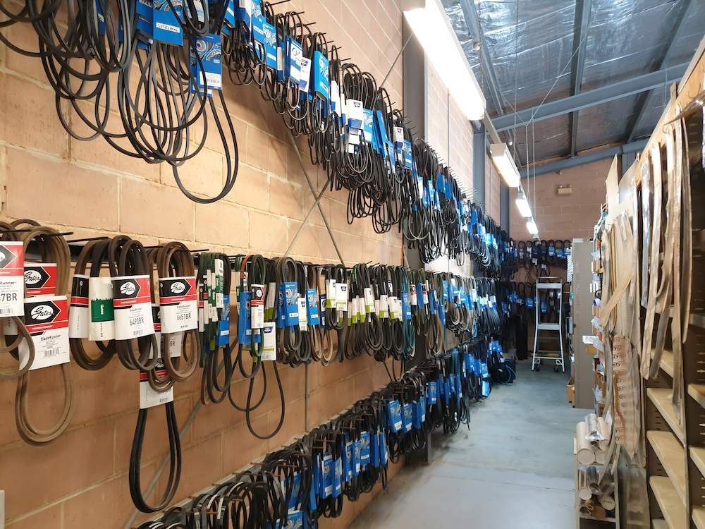 A Warehouse Filled With Lots of Belts Hanging on the Wall — Mid Coast Bearing Centre in Port Macquarie, NSW