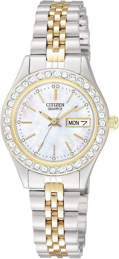Silver and gold Citizen quartz watch with a mother-of-pearl dial, crystal-studded bezel, and date display.