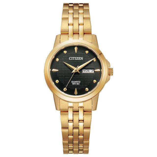 Gold Citizen watch with a black dial and day/date display.