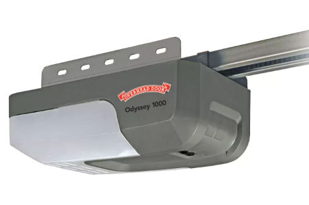 Gray garage door opener motor mounted on a ceiling track with red logo and light gray cover