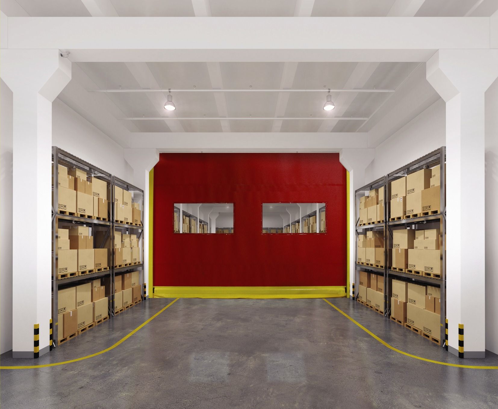 Warehouse aisle with stacked boxes on shelves and a red wall with two windows at the back