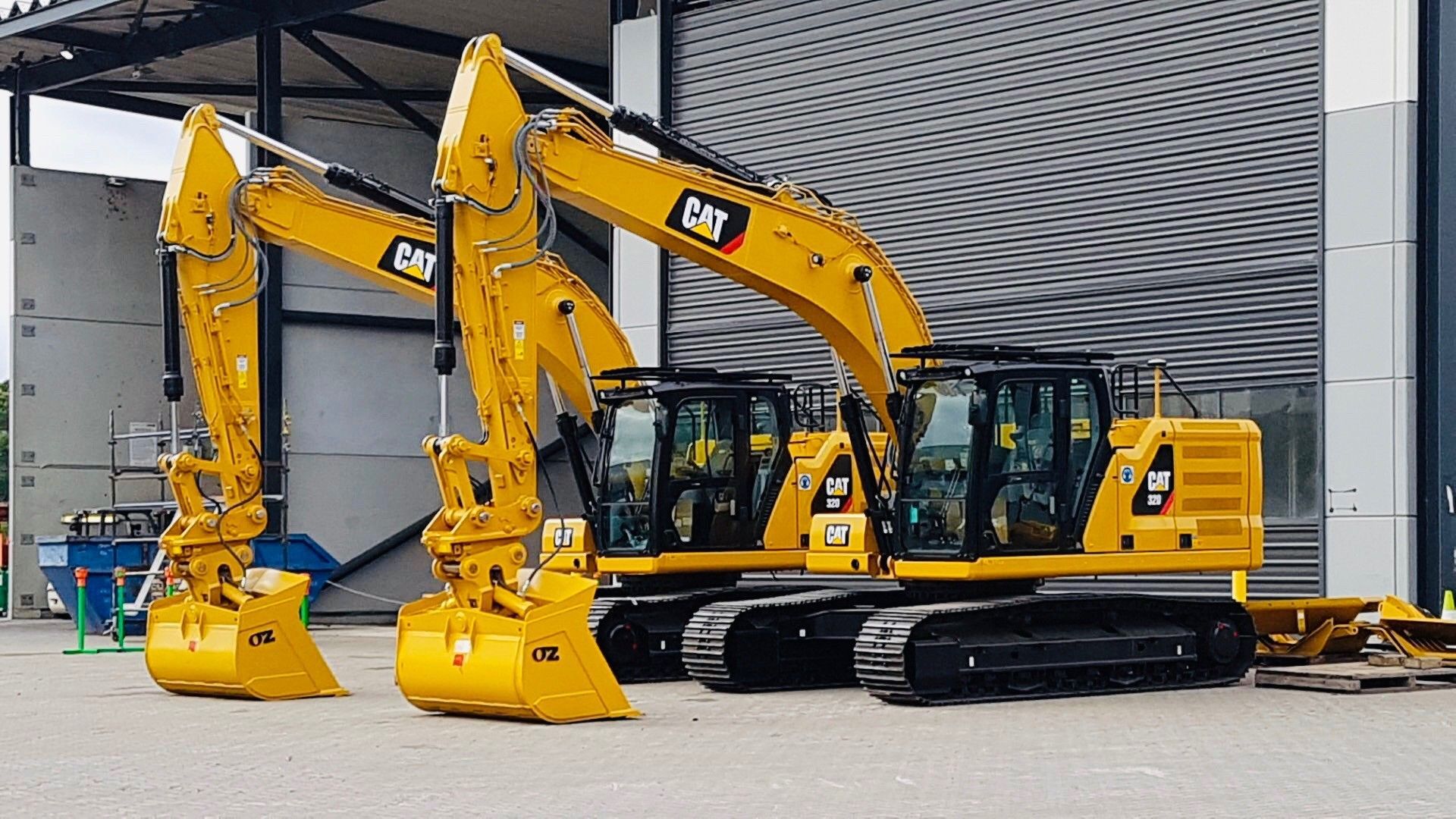 Two yellow excavators at TB Plant Hire