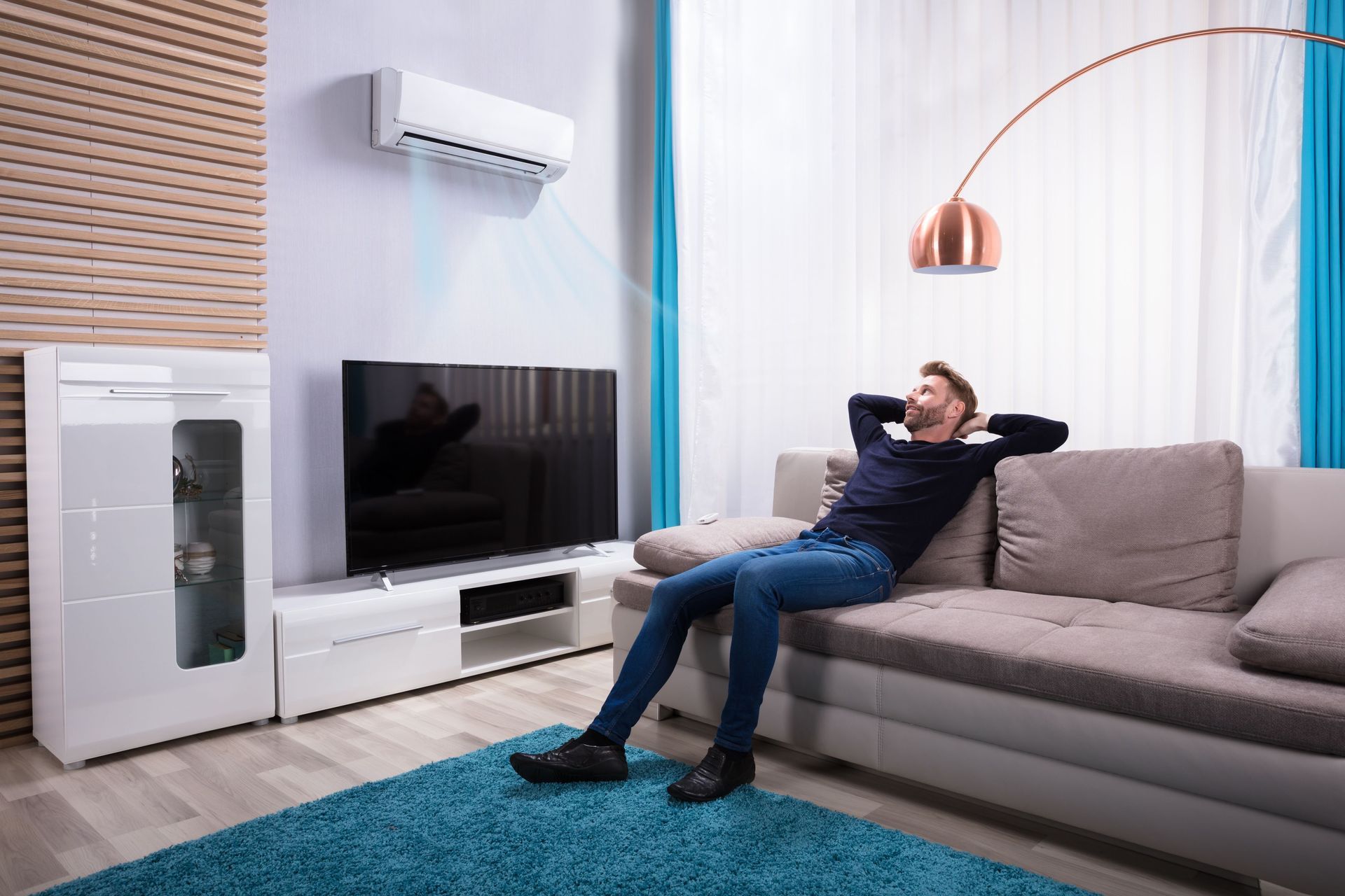 young man relaxing on sofa near