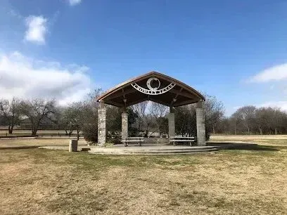 Burleson Electrician -A wooden pavilion with a heart and