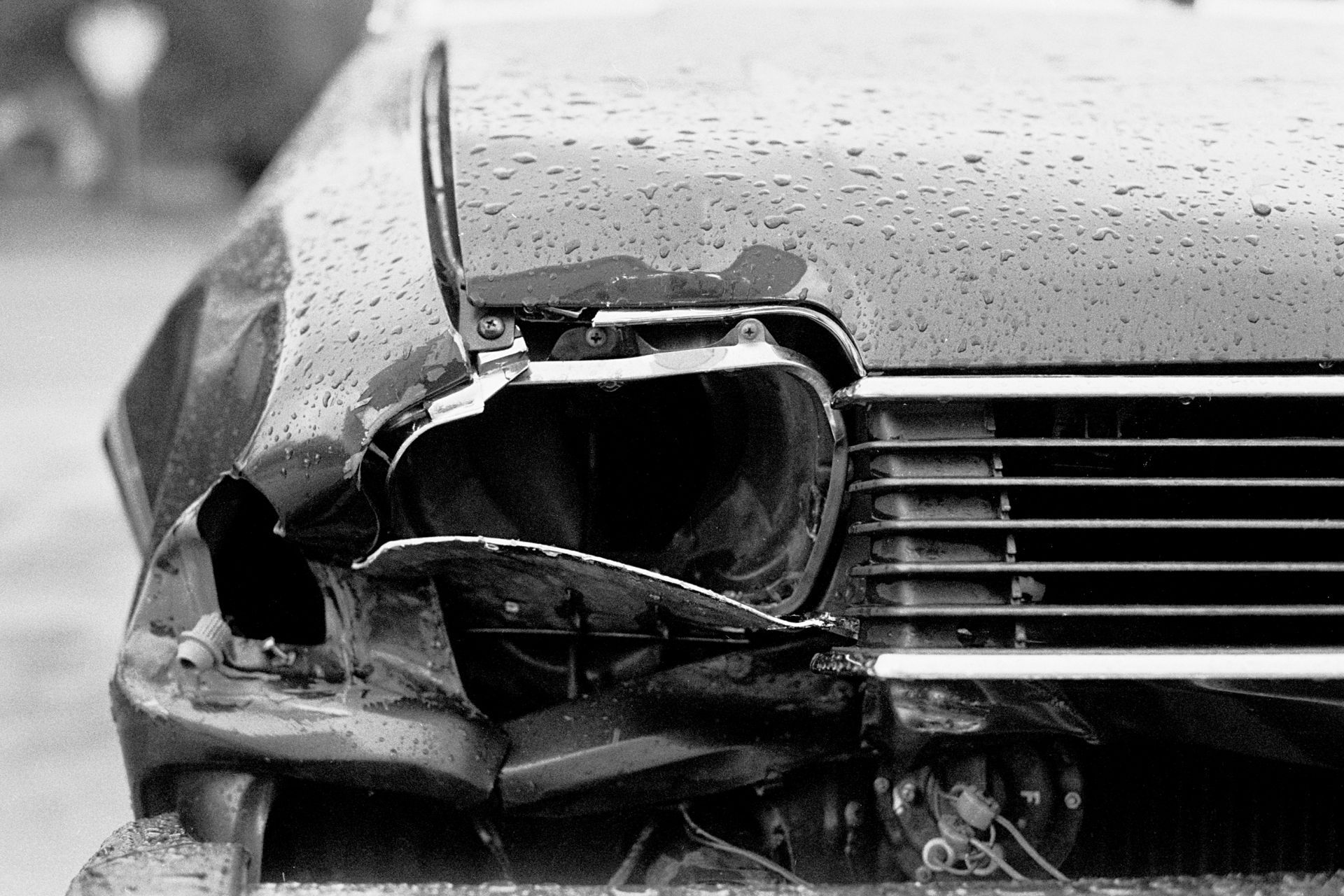 Front bumper damage on a vehicle, showcasing the need of commercial fleet repair services.
