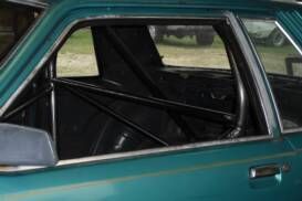 Window of an old car in need of a car tune up