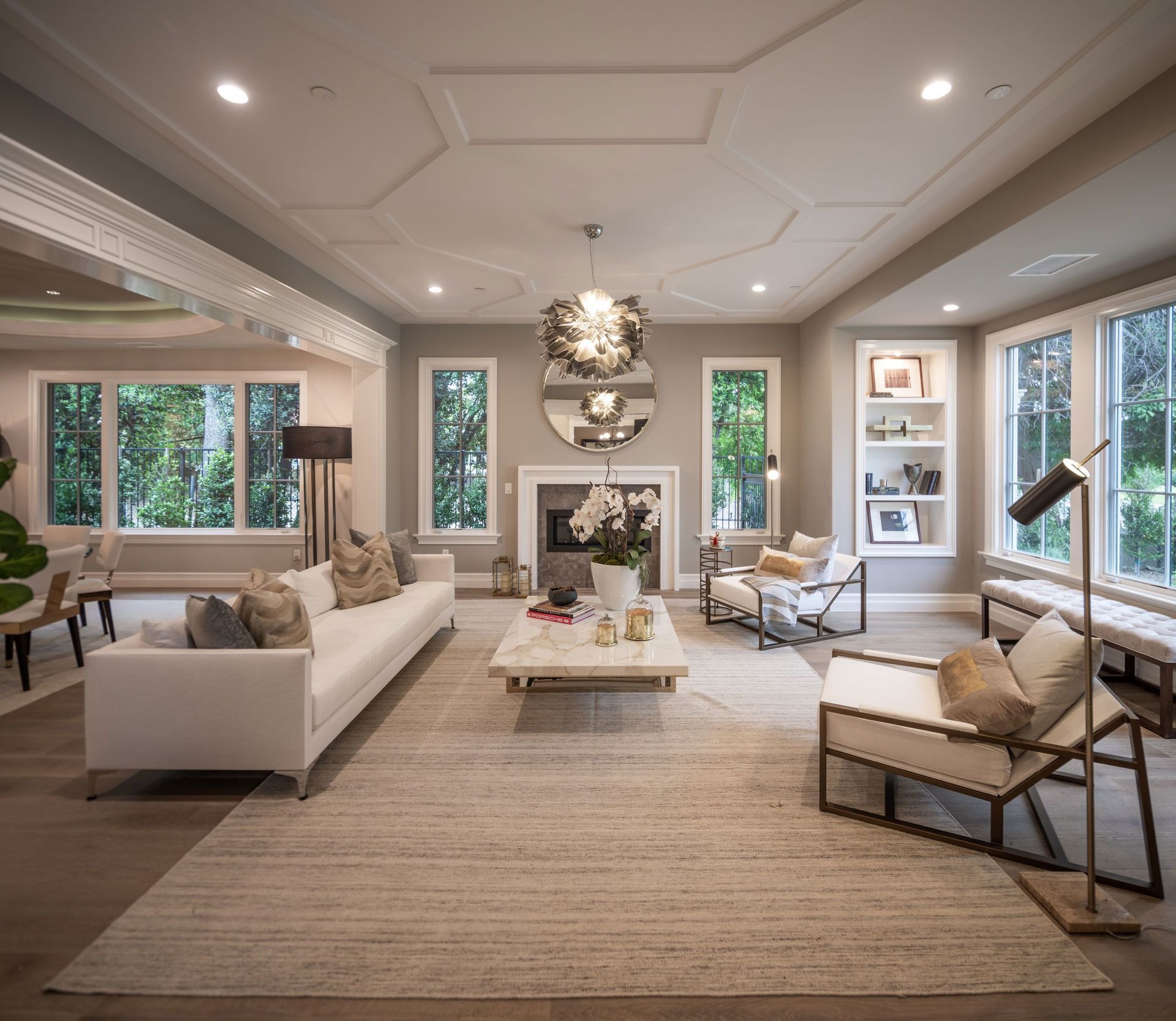 A living room filled with furniture and a fireplace