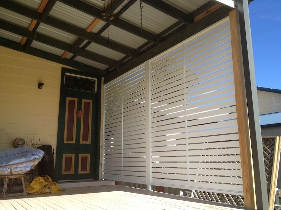 A White Privacy Screen next to a Door — Newcastle & MidCoast Privacy Screens & Gates In Kurri Kurri, NSW