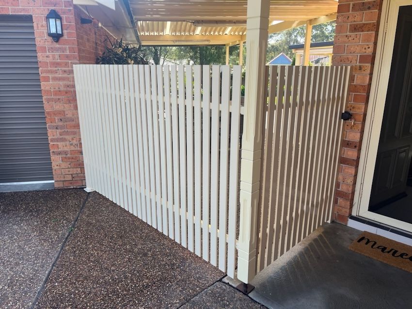 A White Picket Fence with a Lock — Newcastle & MidCoast Privacy Screens and Gates In Maitland, NSW