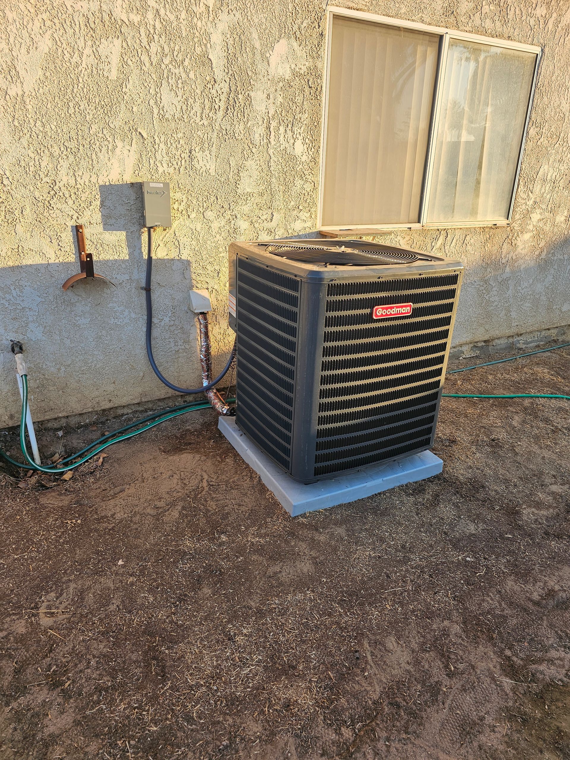 A professional technician performing routine AC maintenance on a unit.