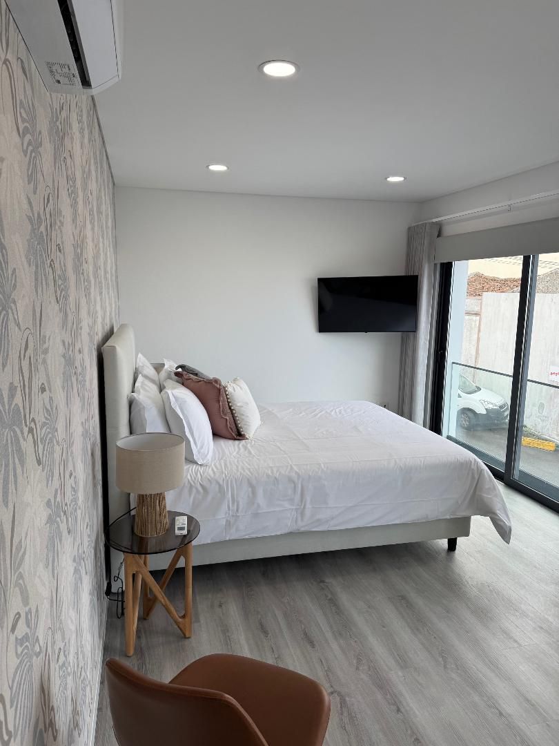 There is a large bed in the middle of the room.