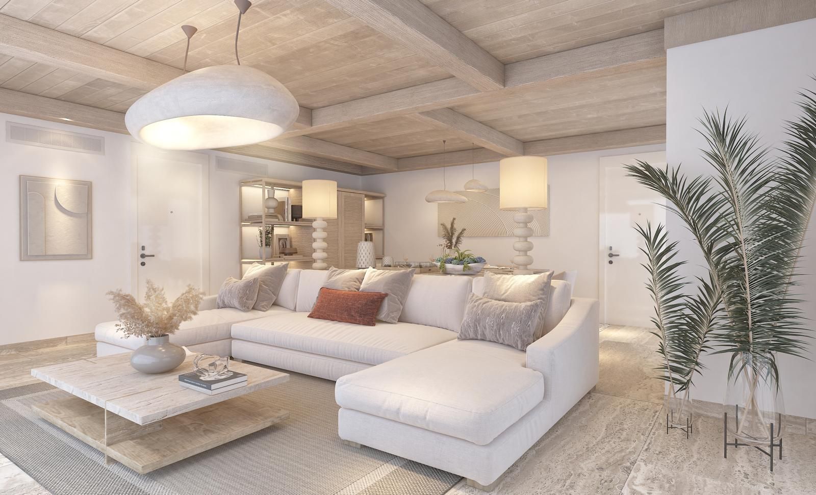 A bright, modern living room with a large white sectional sofa, a square coffee table, and exposed wood ceiling beams.