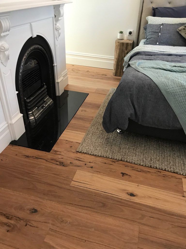 Blackbutt Timber Flooring In The Bedroom — Cairns Floors and More In Bungalow, QLD