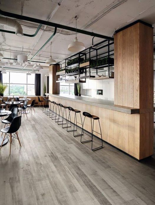 Restaurant With Vinyl Flooring And Chairs on It — Cairns Floors and More In Bungalow, QLD